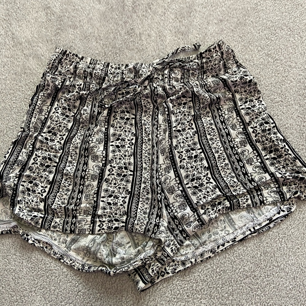black and white floral, elephant patterned shorts